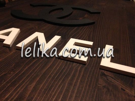 Купити дерев'яна тумба з фактурним написом