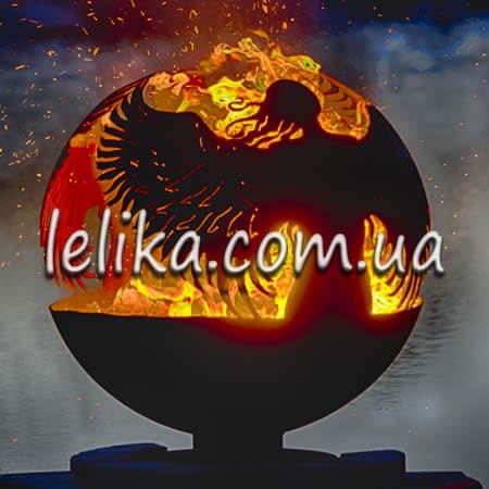 Камин уличный в виде металлического шара с вырезанными узорами