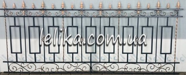 Огорожа металева з кованими елементами